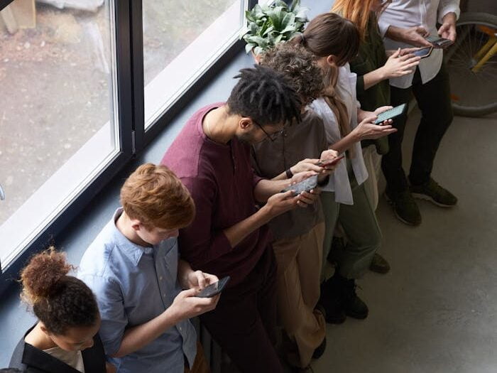 People Holding Their Phones